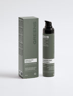 Minimalist bottle of Greens for People Hyaluronic Acid Face Cream for men against a neutral background.