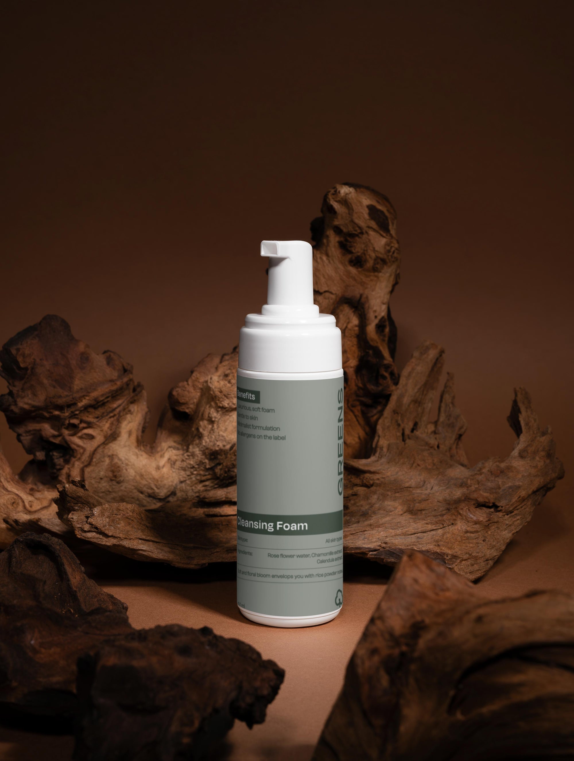 Premium studio shot of the Greens for People Cleansing Foam, a high-performance foaming facial cleanser.